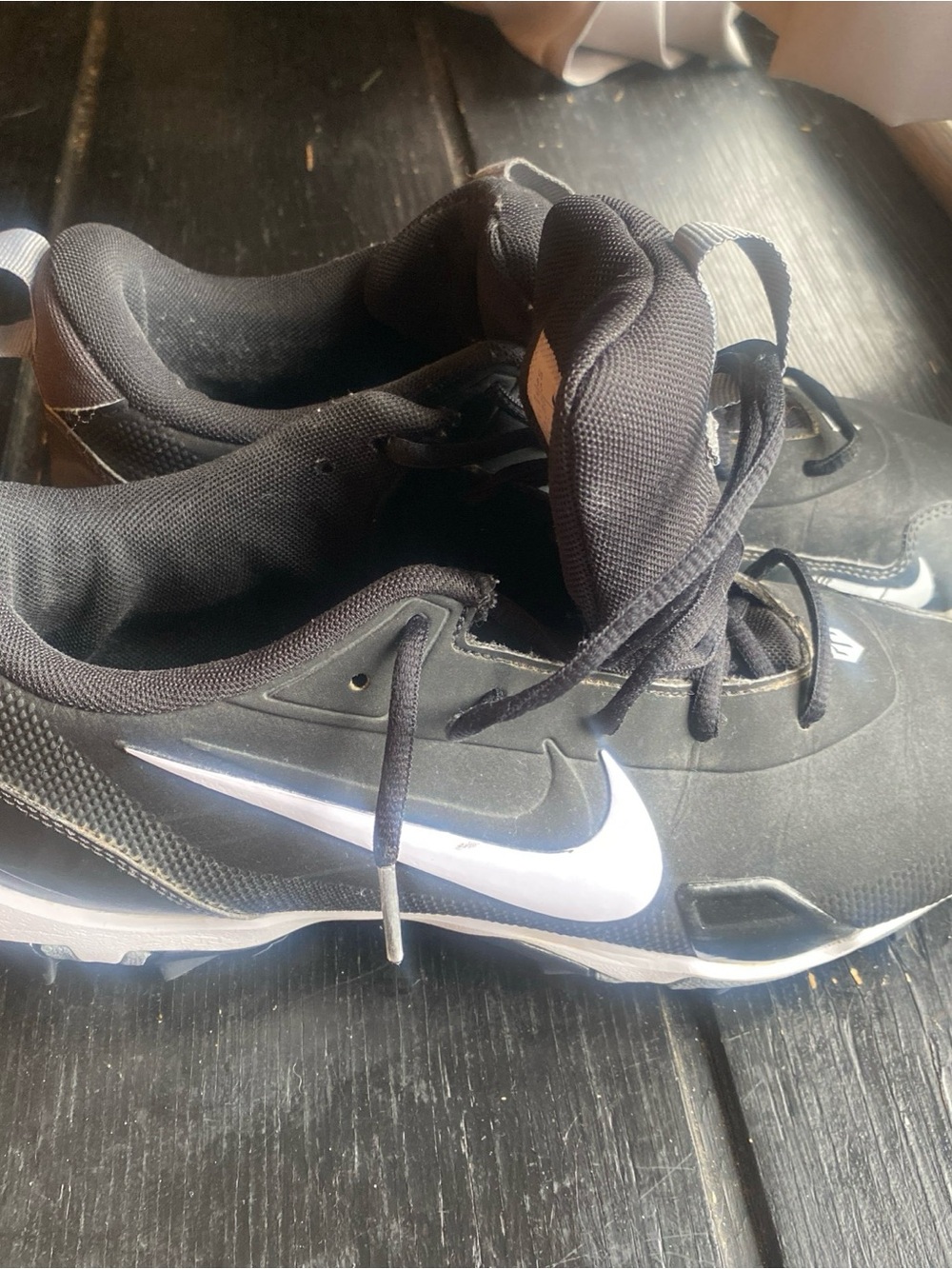 Nike Men’s Black Athletic Cleats with White Swoosh sports cleats